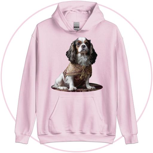 Regal Cavalier pup sits on her royal cushion